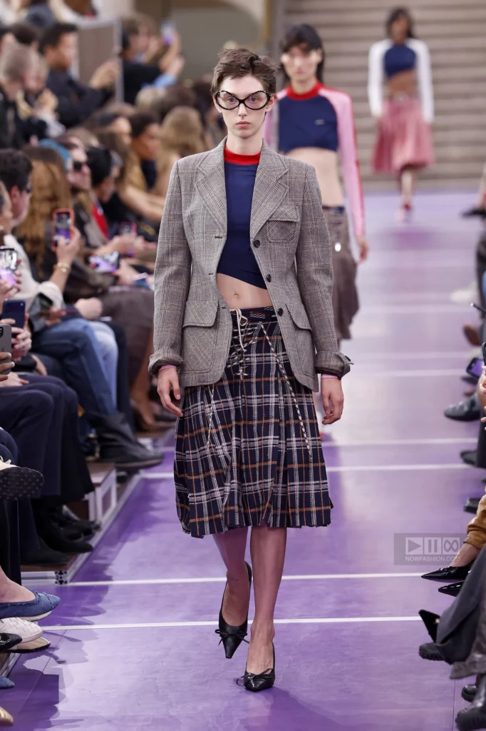 Model on the runway at the Miu Miu fashion show in Paris, Spring Summer 2027 Ready To Wear Fashion Week, Runway Look #002